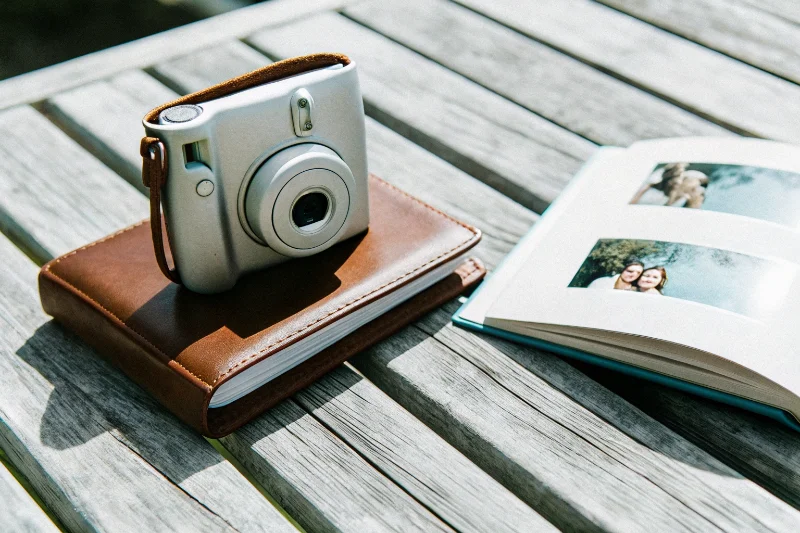 An open album with pockets perfectly sized for instant photos like Instax Mini